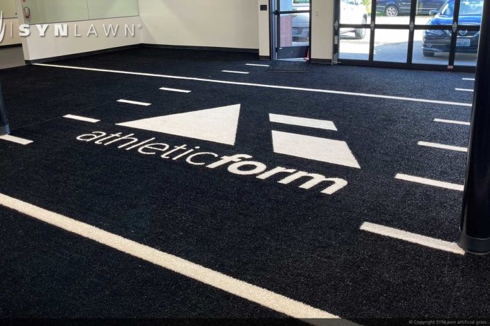 image of SYNLawn Los Angeles California Prefab turf logos for athletic weight room applications