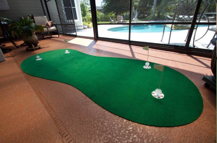 Residential indoor putting green in a patio area
