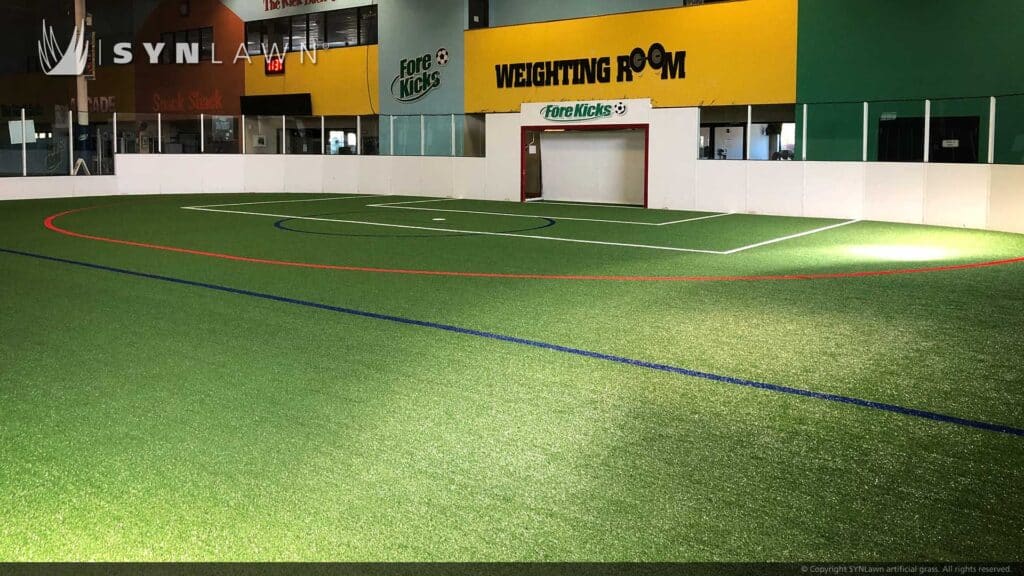 Indoor soccer field with artificial grass